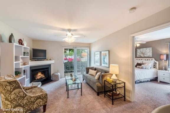 Living Room With Expansive Window at Brittany Commons Apartments, Virginia